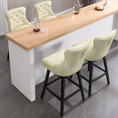 Moskell Swivel Upholstered Bar Stool