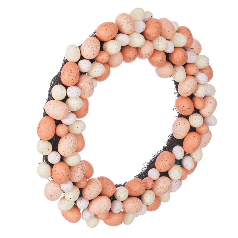The Holiday Aisle® 18" Artificial Easter Eggs Wreath. Features Easter eggs on a grapevine base., Coral