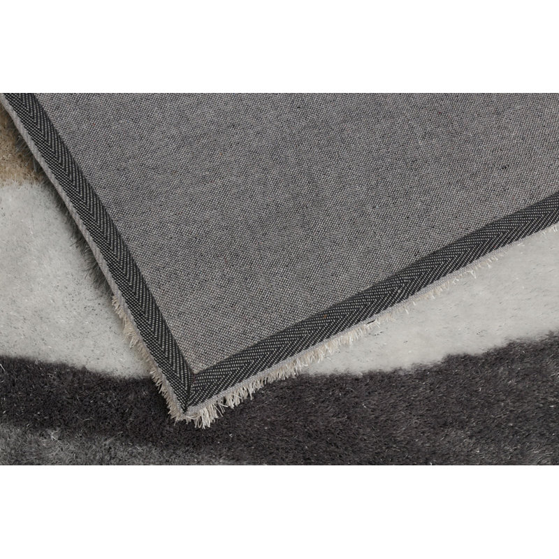 Soft Area Rug With Abstract Design