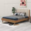 Lit en bois avec tête de lit tapissier en forme de clé de piano et pied central-478422802