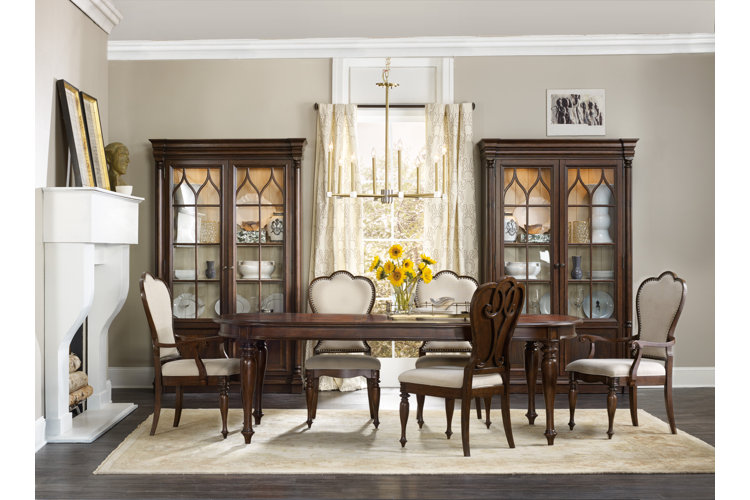 dining room table with chandelier overhead lighting
