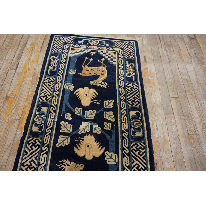 Tapis bleu antique en laine Baotou