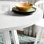Table de salle à manger ronde contemporaine avec base à tréteaux en blanc pour Pleasant Graceful