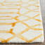 Tapis jaune en laine touffeté à la main à motif géométrique-787951821