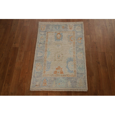 Tapis beige en laine noué à la main de conception unique nouvel âge 2 pi x 2 pi 11 po Sarujan