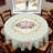 Light green washable polyester tablecloth with pink floral print