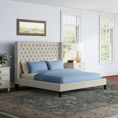 Allyonna Upholstered Wingback Bed