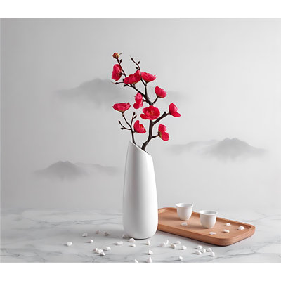 Arrangement de fleurs de prunier