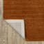 Tapis en laine rouille unie Makhari-1003433167