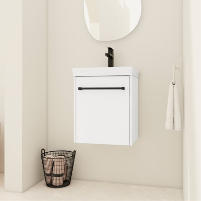 Meuble-lavabo en céramique. Porte à fermeture amortie pour une utilisation silencieuse. Décor moderne pour petites salles de bain. Meuble-lavabo en contreplaqué avec comptoir de travail. Installation suspendue. Salles de bain design. Meuble sous-vasque.