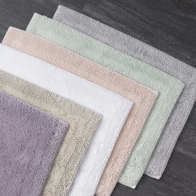 Tapis pour salle de bain Plemmons, l 17 po x L 24 po, Rosé