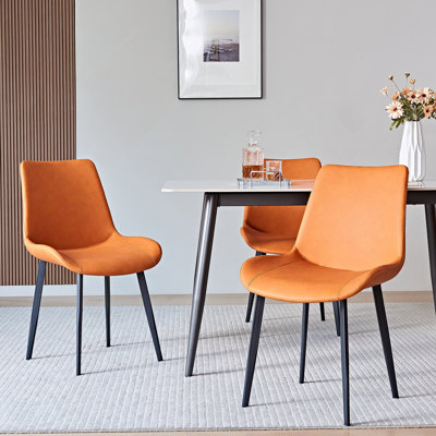 Ensemble de deux luxueuses tables de salle à manger en cuir de polyuréthane avec pieds robustes en fer, pour rehausser tout espace repas