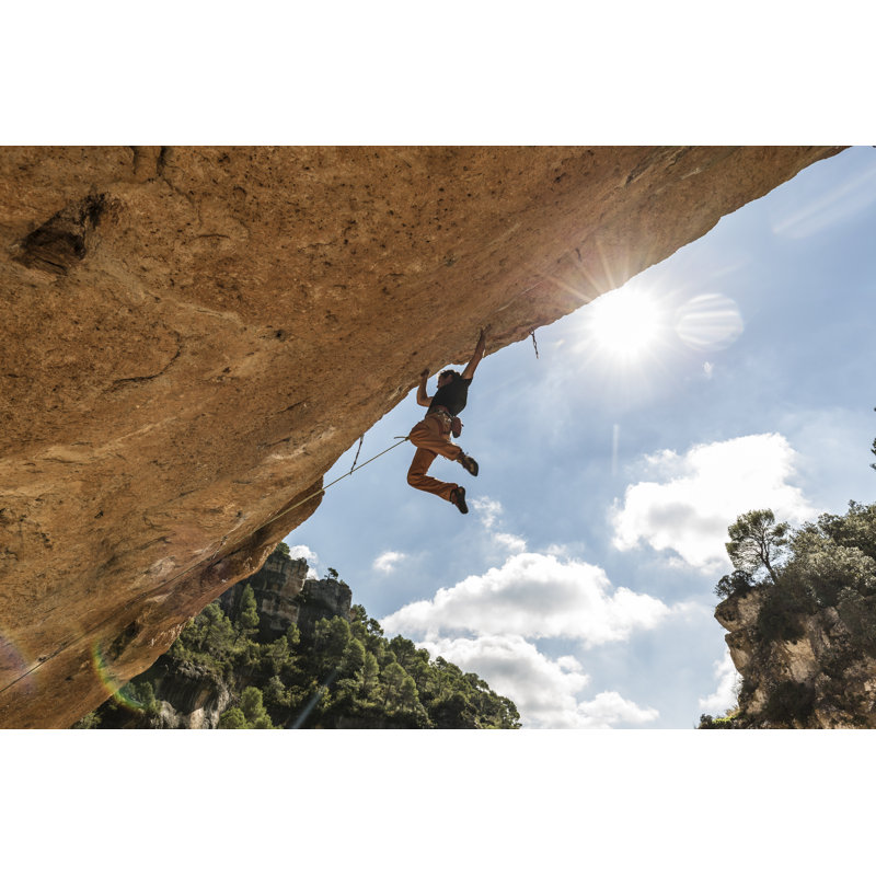 Man Practicing Rock Climbing by Aluxum