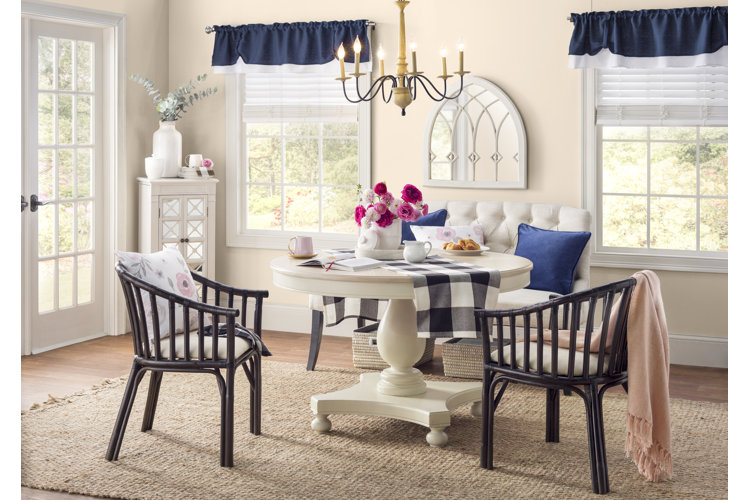 kitchen with blue valances on the windows