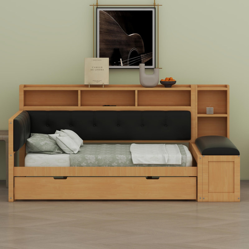 Lit de jour multifonctionnel avec couchette coulissante, tablettes de rangement intégrées et station de charge intégrée