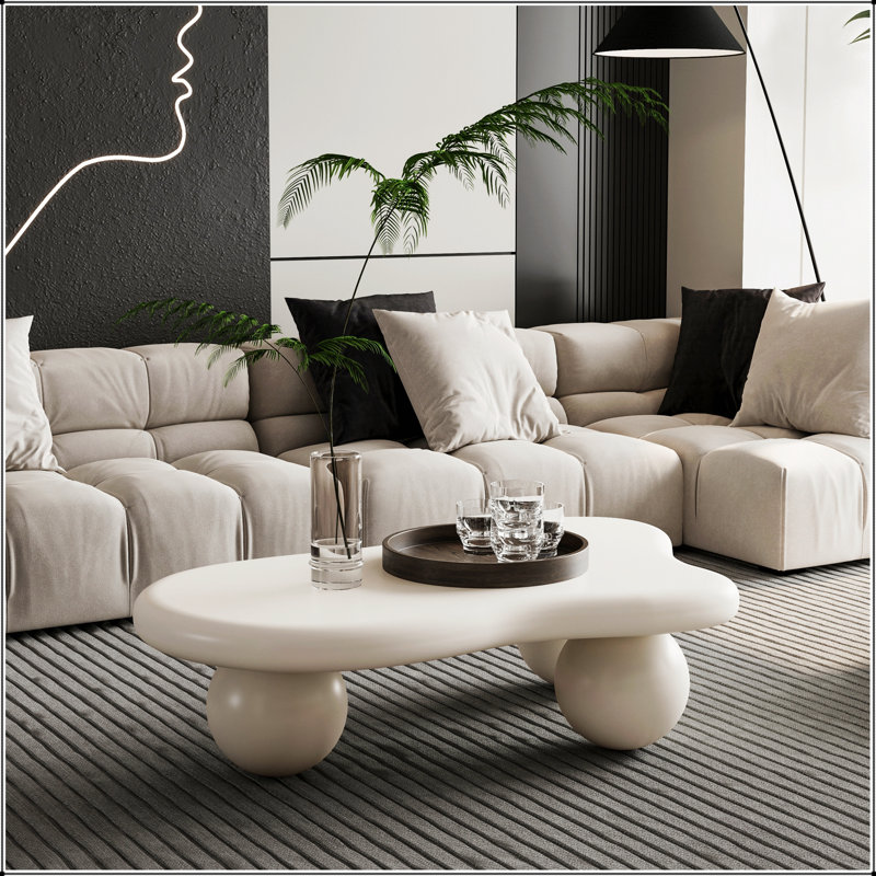 Table basse de 40 pouces en forme de nuage avec 3 pieds sphériques, parfaite pour ajouter élégance et modernité à votre salon
