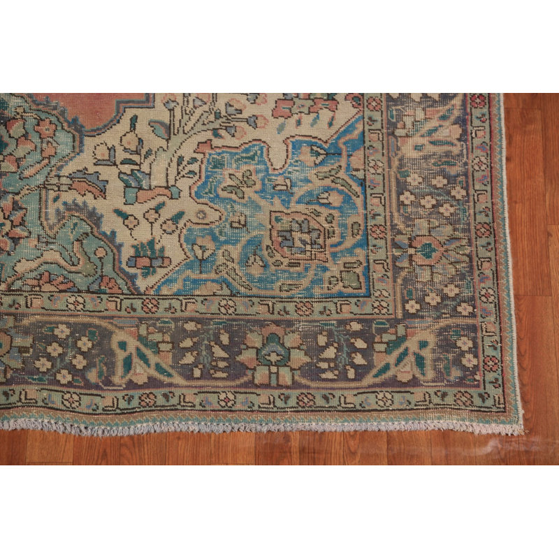 Tapis traditionnel rose en laine à motif géométrique 7 x 10