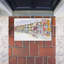 Tapis de porte d'extérieur imprimé Quaint Coastal Town Buildings, par Tim Coffey, 18 po x 30 po