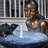Girl Playing By Water Fountain with White LED