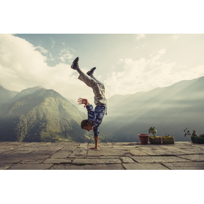 Man Handstand In Mountain by AnnaTamila - Wrapped Canvas Print