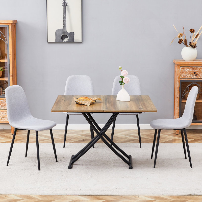 Ensemble de table et de chaises. Plateforme de levage multifonctionnelle minimaliste moderne, bureau en panneau de fibres à densité moyenne, pieds en métal. Jumelé à 4 chaises.