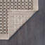 Tapis intérieur / extérieur beige / noir en polypropylène tissé à la machine Moncure-732763030
