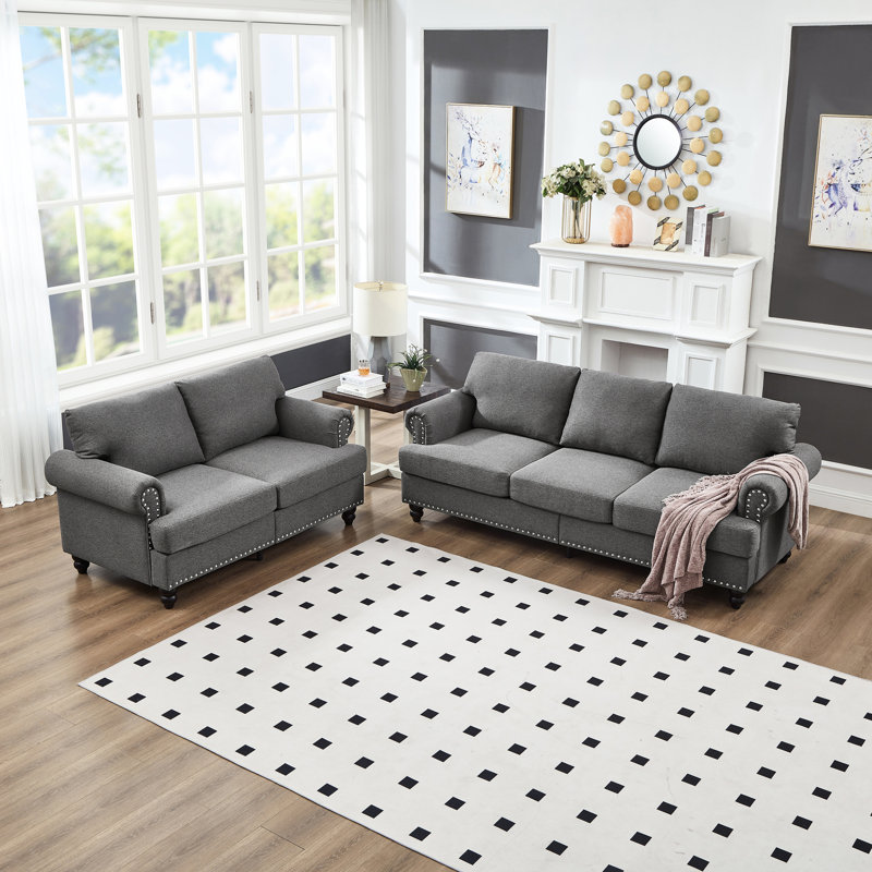 Canapé en tissu moderne à 5 places pour le salon, tissu d'ameublement gris, rond avec clous, structure en bois massif, coussins amovibles, espace de rangement sous les sièges