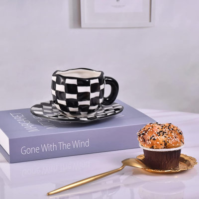 Black and white checkered latte cup