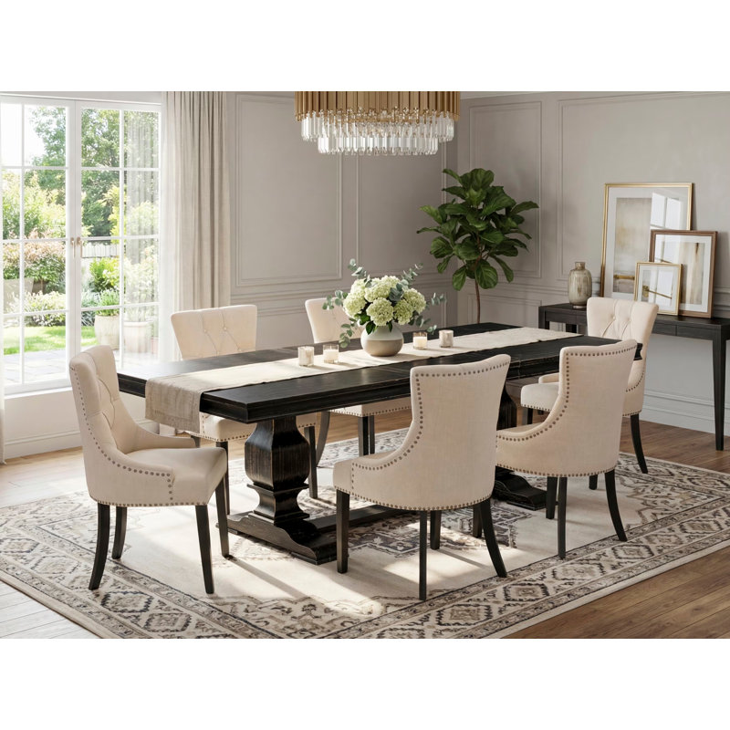 L'ensemble de salle à manger 7 pièces comprend une table de salle à manger et 6 chaises de cuisine en tissu de lin beige clair et des pieds noirs avec un dossier capitonné - finition noir sablé.