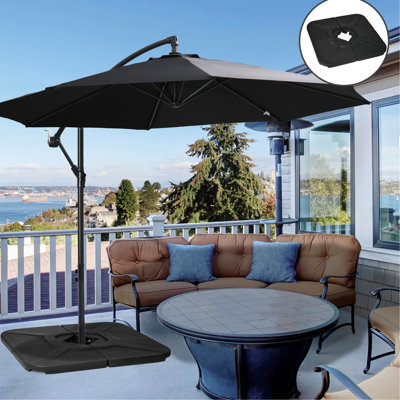 Poids de base pour parasol en porte-à-faux 175 lb - 4 pièces. Noir Fortifiez le vent et la pluie avec de l'eau / du sable. Patio portatif et empilable