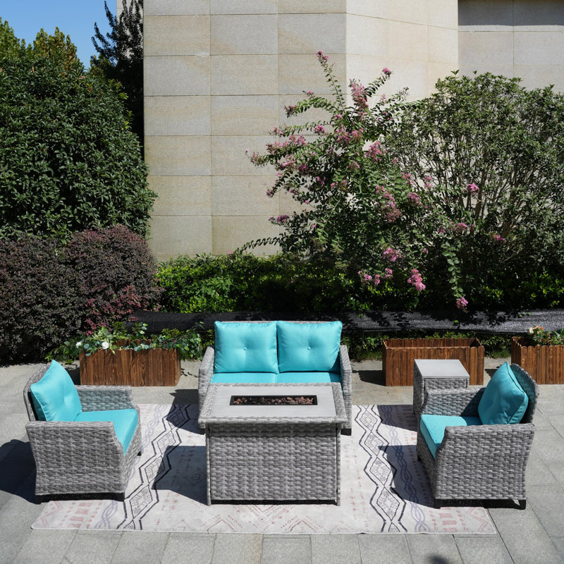 Woodrum Wicker 4 - Person Patio Conversation Set with Cushions, Cyan