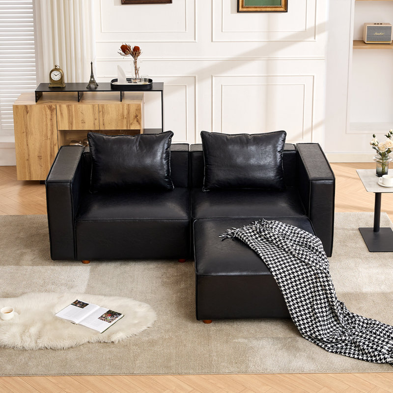 Canapé surdimensionné de 118,5 po en cuir avec repose-pieds et coussins réversibles, Noir