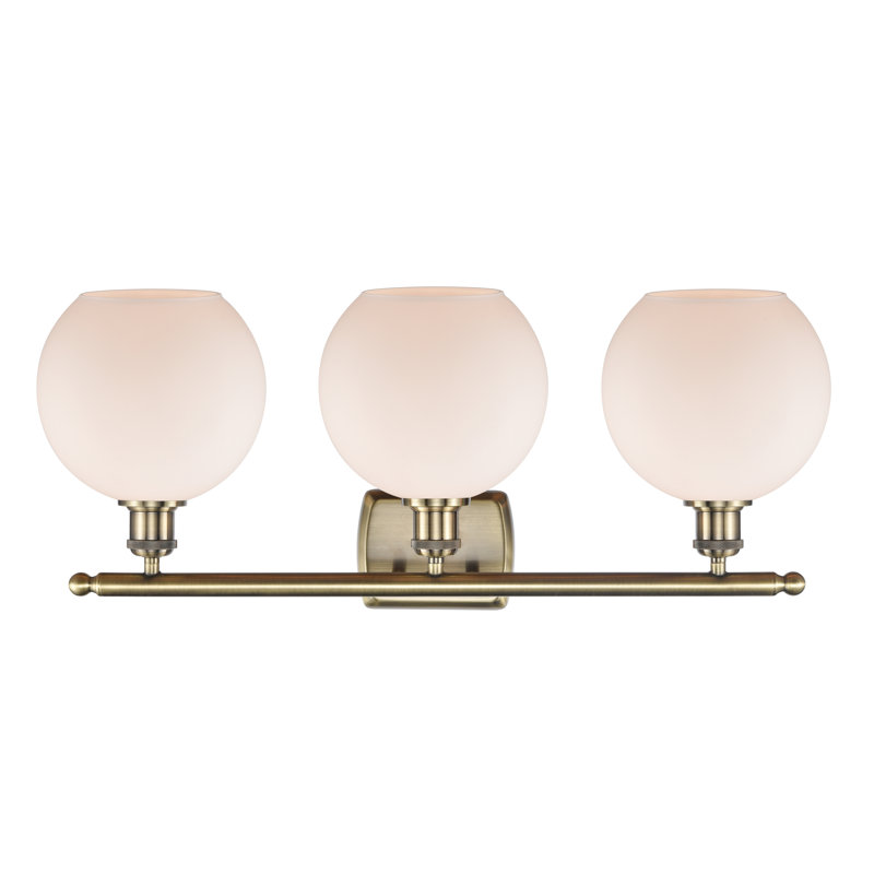 Éclairage pour meuble-lavabo en laiton antique à 3 lumières Cindi, Laiton antique, Blanc mat, Incandescente