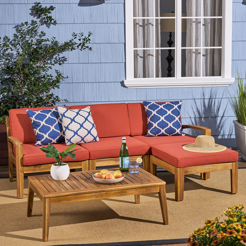 Élégant canapé modulaire d'extérieur rouge - Bois et eau - Coussins avec table basse et bois élégant, tissu