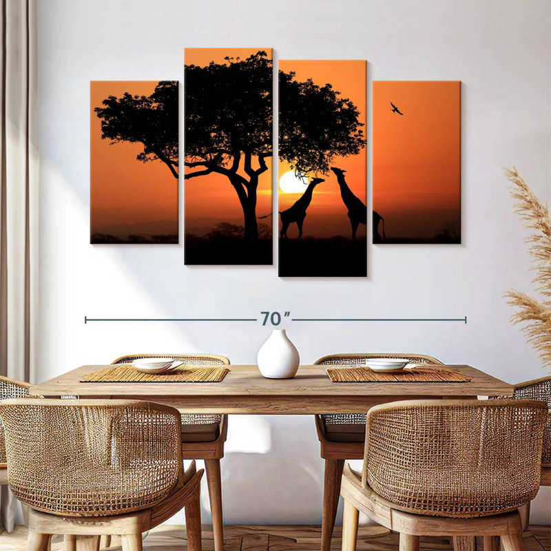 Couple de girafes au coucher du soleil