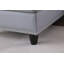 Canapé modulaire en faux cuir gris avec repose-pieds en L