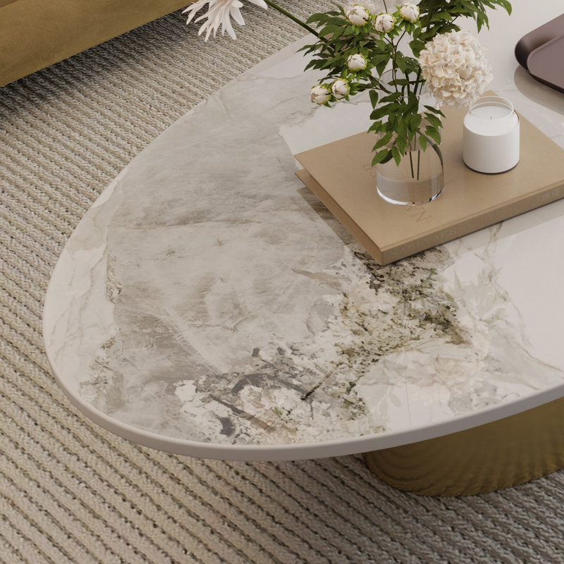 Table basse ovale imitation marbre, 125 x 68 x 39 cm, dessus en pierre frittée, finition blanche et dorée