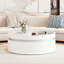 Table basse ronde à plateau relevable avec tiroir