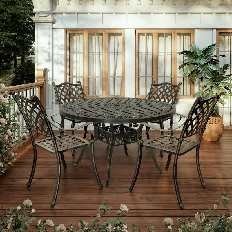 Tsavag 4 - Person Metal Patio Dining Set with Round Table, Brown