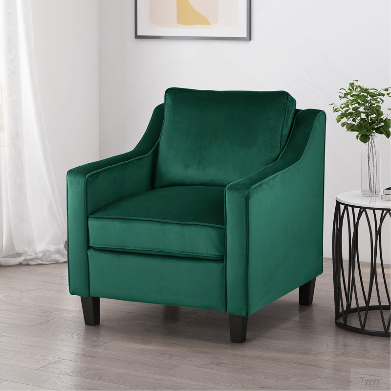 Fauteuil club en velours vert