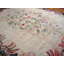 Tapis ivoire américain à médaillon floral
