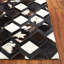 Tapis en cuir-107495275