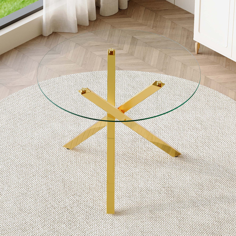 Table de salle à manger ronde moderne en verre avec structure en métal en forme de X