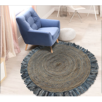 Whimsical Hand-braided Natural Fiber Jute Round Indoor Area Rug with Fringe