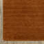 Tapis en laine rouille unie Makhari-1003433150