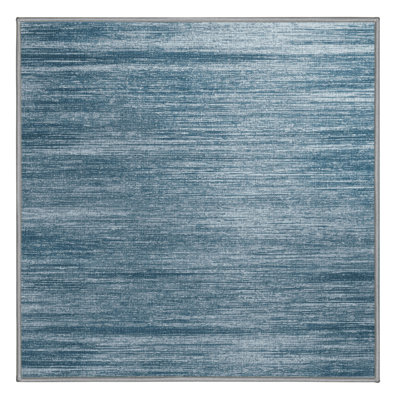 Tapis gris uni lavable à la machine