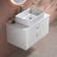 Meuble-lavabo moderne simple avec lavabo vasque en céramique et armoire de rangement large, parfait pour les espaces contemporains et l'organisation efficace.