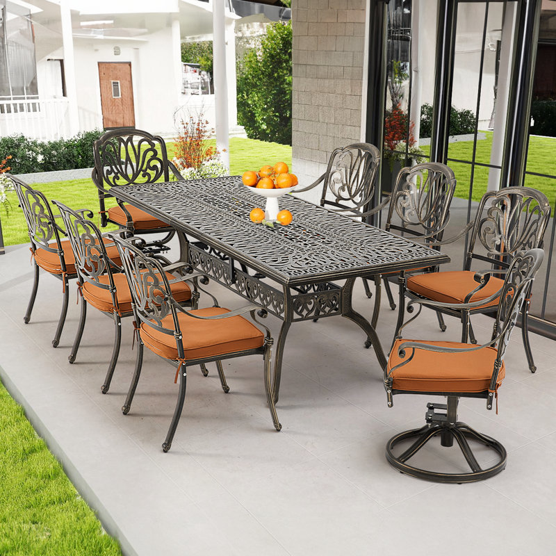 Ashauntae 8 - Person Patio Dining Set with Rectangular Table , Cushions Included