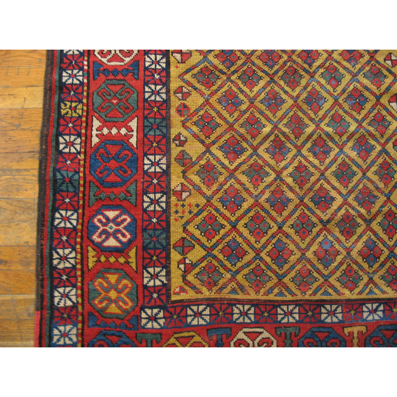 Tapis de couleur jaune à motif géométrique tribal Shirvan