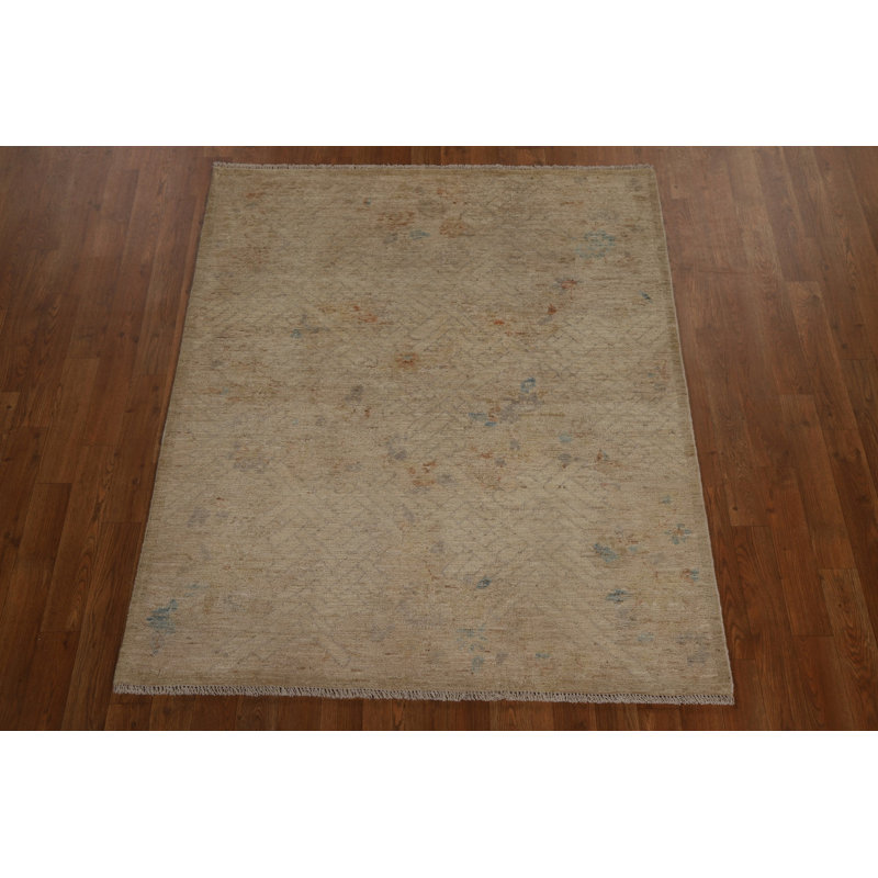 Tapis unique beige et ivoire 4 pi 10 po x 4 pi 0 po